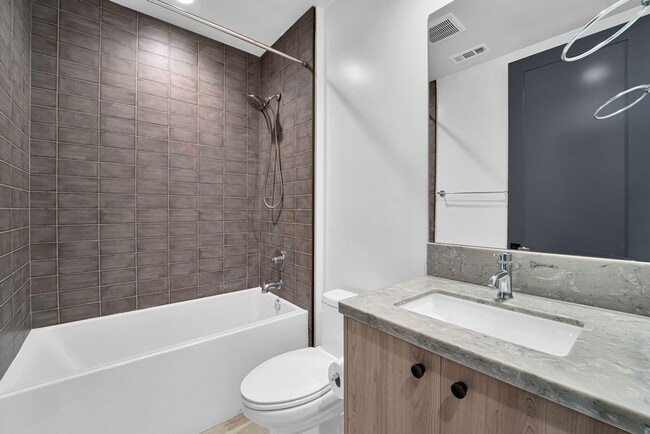 Building Photo - Modern 4-Bed with Rooftop Balcony & Dual Primary Suites