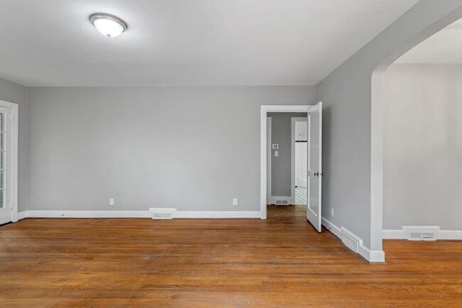 Building Photo - Brick home, Two Story, Hardwoods, DR, 2 Sun Rooms, FP, Carport!.