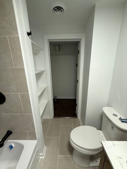 UPDATED bathroom - 3350 W Cuyler Ave