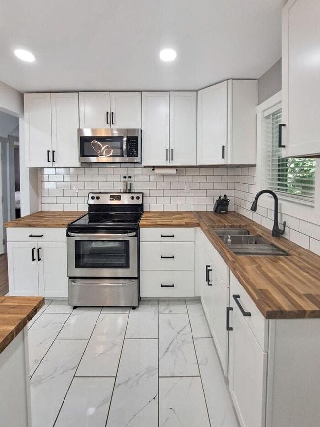 Building Photo - Coming Soon! Mid Century Modern Cape Cod i...