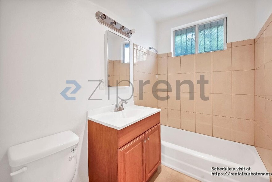 Building Photo - 2458 Normandie Ave