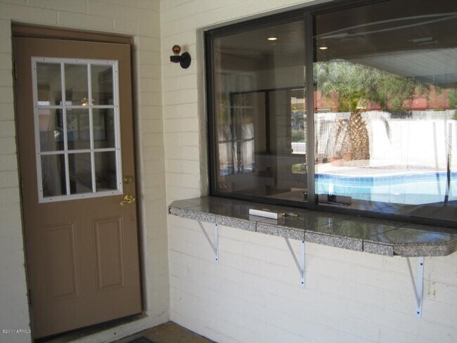 Building Photo - “Spacious 4-bedroom home with private pool in prime Tempe location!”