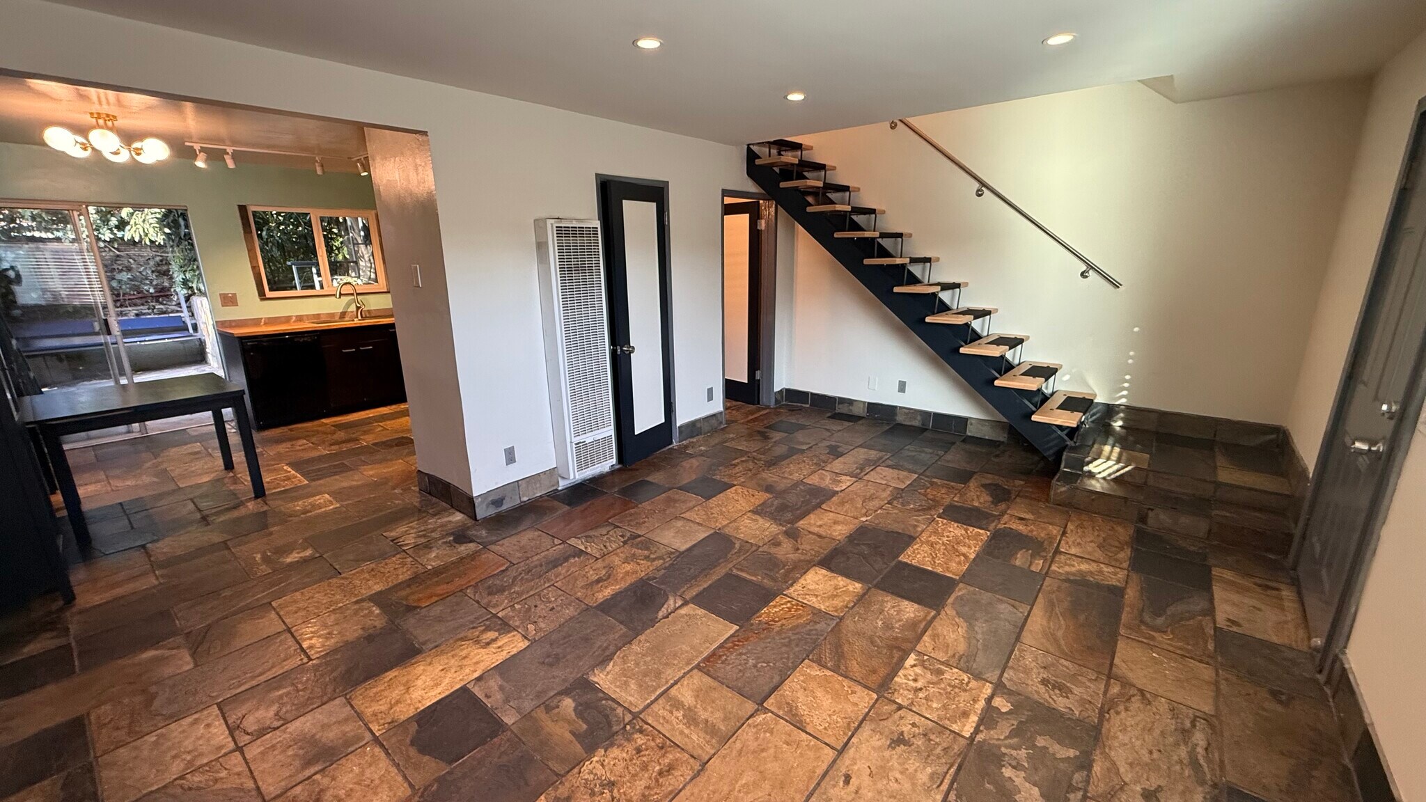 Stairway and 1/2 bath and laundry room - 1320 Mohawk St