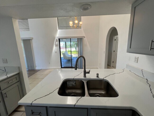 Building Photo - $1,875 ** ANNUAL ** Available 10/15/25 - Newly Renovated ** 3/2 Single Family Home with Oversized...