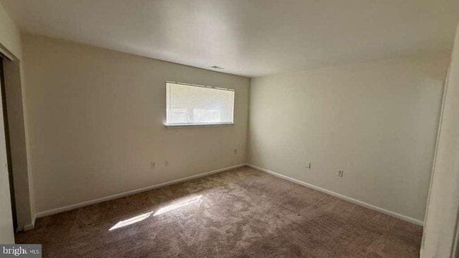Building Photo - 8103 Greenspring Way