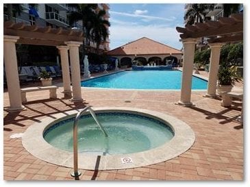 Building Photo - Rare 2/2 Corner Penthouse with Panoramic Lagoon Views from Every Room – Available Now!