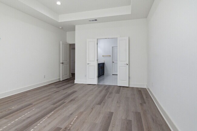 Building Photo - "New Construction 3-2-2 Home with Designer Touches Throughout!"