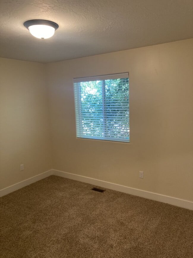 Building Photo - Move-In Discount! 2 Bedroom + Den/Office 2...