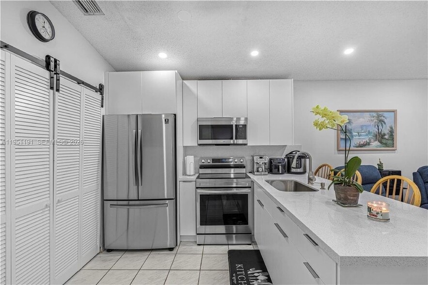 Building Photo - 7117 W 30th Ln