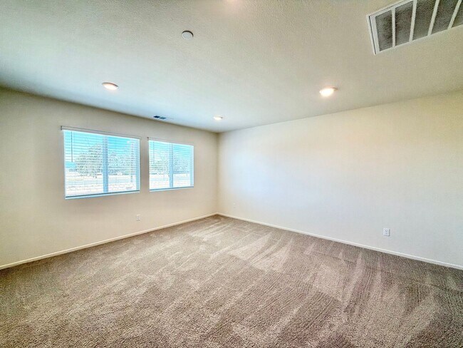 Building Photo - Modern 4 Bedroom 3 Bathroom Living with INCLUDED Solar & Entertainer’s Backyard