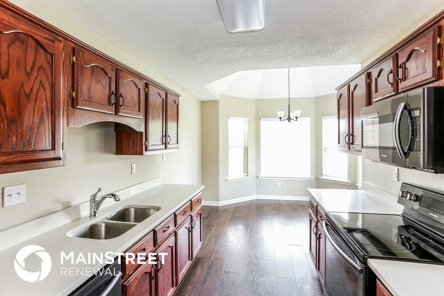 Building Photo - 7644 Tally Ho Dr E