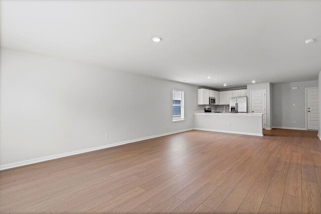 Building Photo - New 3BR Home in Whispering Woods – Modern ...