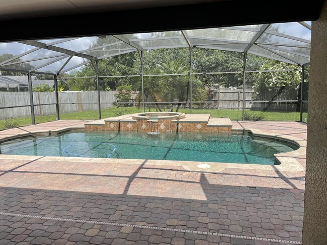 Building Photo - Beautiful 3 Bedroom 2 Bath Pool Home Lawn ...