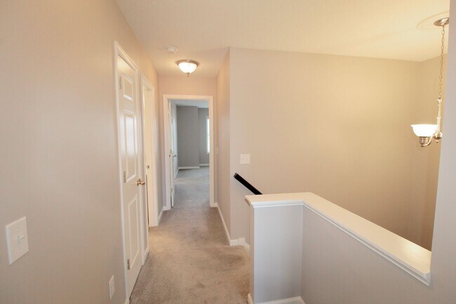 Building Photo - Upscale townhome  with attached garage for rent in the Townes at Bluestone!