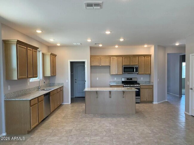 Building Photo - 13484 W Range Mule Dr