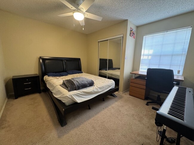 Building Photo - Modern 2-Bed/2-Bath Condo in Gated Communi...