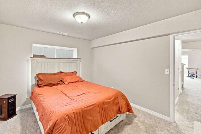 Building Photo - Beautiful 2025-Built 5 Bedroom Home with Finished Walk-Out Basement