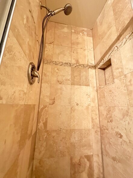 Travertine tile shower and separate soaking tub - 397 S Pickett St