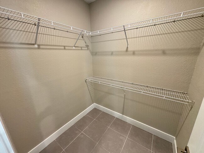 Building Photo - Spacious 4-Bedroom Home in Poinciana – Internet Included & No HOA Approval Required