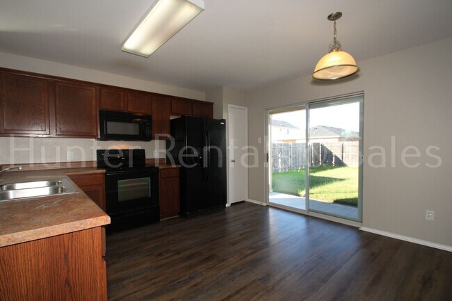 Building Photo - Modern Comfort in Meadows of Trimmier