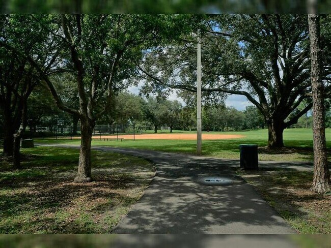 Building Photo - Spacious 1-Bedroom Condo with Modern Upgra...