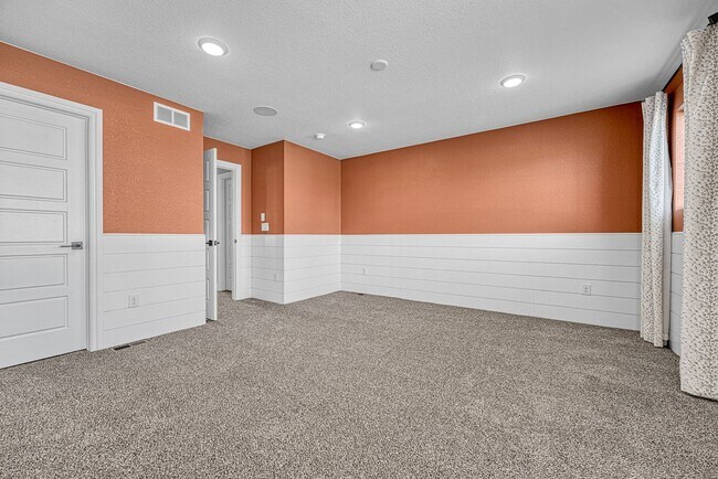 Building Photo - Former Model Home - Superb townhome in great location!