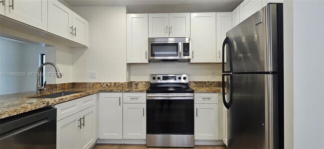 Building Photo - 11323 Royal Palm Blvd