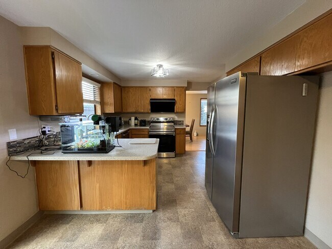 Building Photo - Light-Filled Three Bedroom Home with Private Bonus Space and Outdoor Living