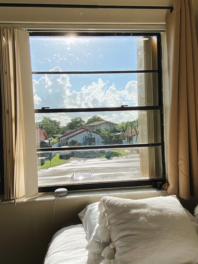 The 1 bedroom for rent faces the cul-de-sac. The window has black-out curtains. - 2512 SW 113th Ct