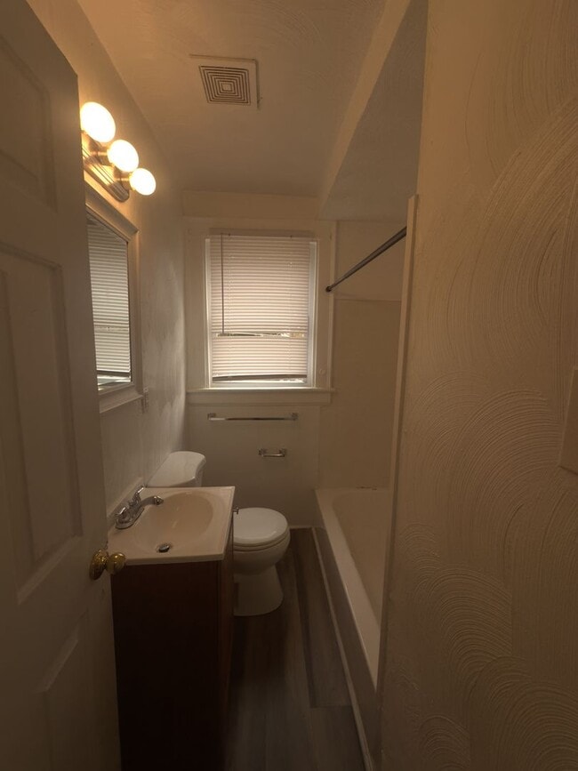 Building Photo - Three Bedroom Available Soon!