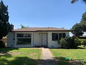 Building Photo - 3 + 3 Spacious Home in a Peaceful Neighbor...