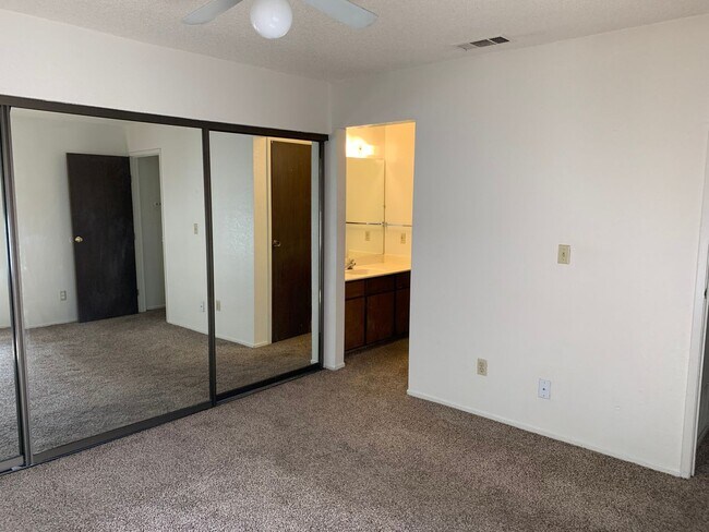 Building Photo - ENJOY THE POOL THIS SUMMER IN THIS GATED C...