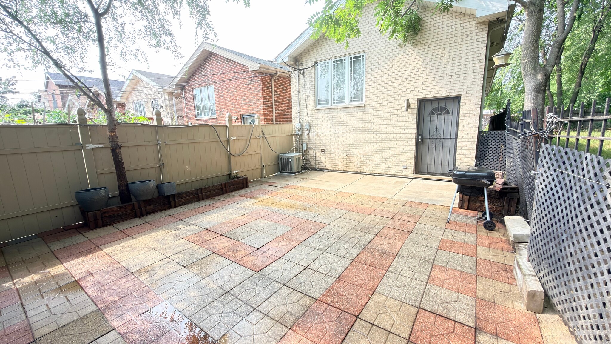 Patio has brick pavers. Private, secure, quiet neighborhood. - 419 W Root St
