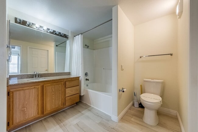 Building Photo - Move-In Ready Condo with Private Balcony & Modern Upgrades