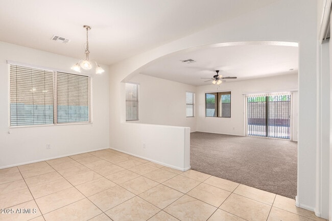 Building Photo - 9883 W Harmony Ln