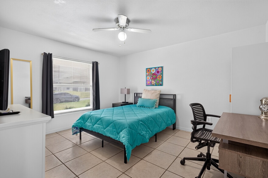 Room 1: Full-Size Bed, Portable Closet, Dresser, Television & Workspace - 217 Ichabod Ave