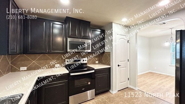 Building Photo - 11523 North Peak-