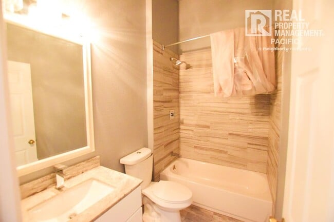 Building Photo - Renovated 5BR Home with Parking & Outdoor ...