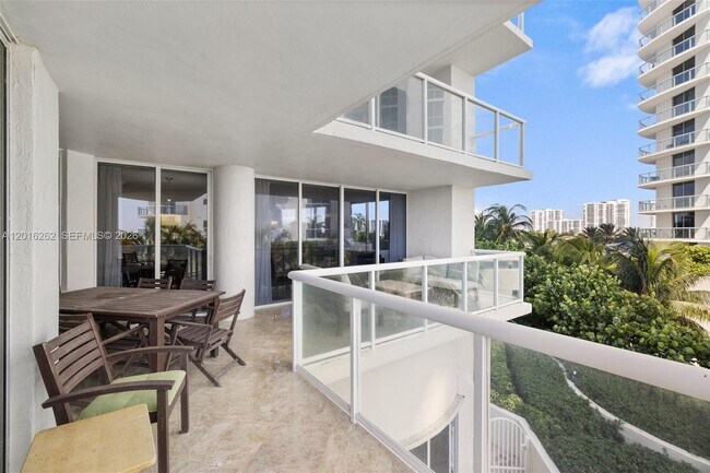 Building Photo - 18671 Collins Ave