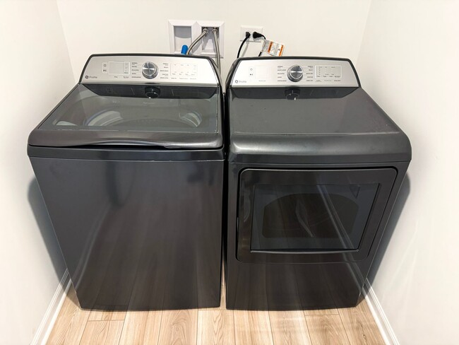 Building Photo - Step into modern living with this brand-ne...