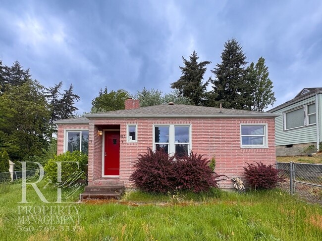 Building Photo - Timeless Charm Meets Comfort – 2-Bedroom Brick Home with Fireplace & Fenced Yard