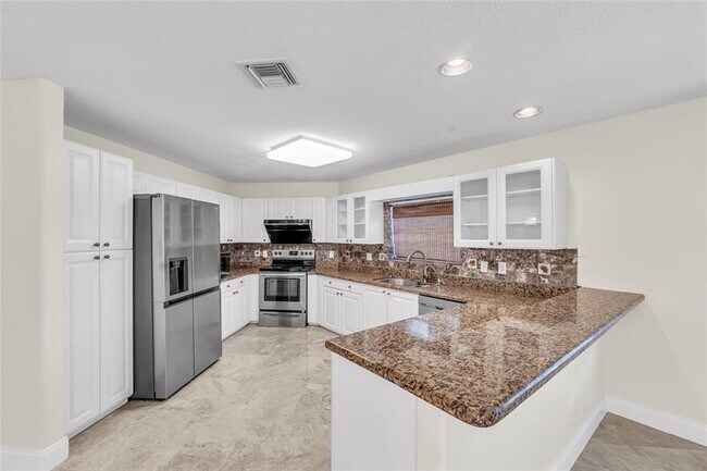 Building Photo - 5911 NW 59th Ave