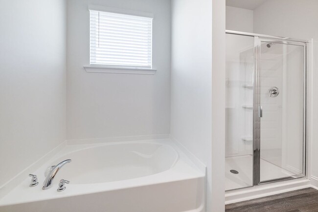 Building Photo - Beautiful 4BR Home in Woodland Trail – Top...