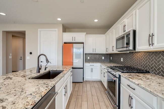 Building Photo - Amazing 4BR 2.5BA Home w/ 3-Car Tandem Garage • Pool Access • Yard w/ Fire Pit in Saguaro Trails