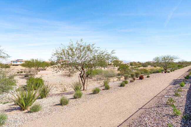 Building Photo - 10812 E Tesla Ave