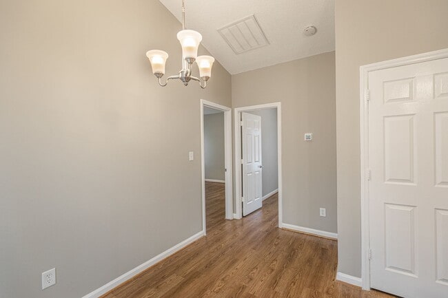 Building Photo - Like New Home off Freeman Mill.  Just Painted, New Wood/Vinyl Flooring, Vaulted Ceilings, Front P...