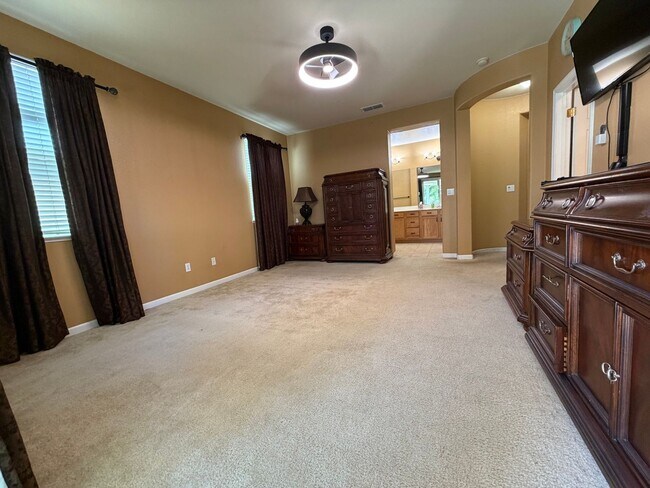 Building Photo - Spacious 4-Bedroom Elk Grove Home with Updated Kitchen, Quartz Countertops! VIEW TODAY!