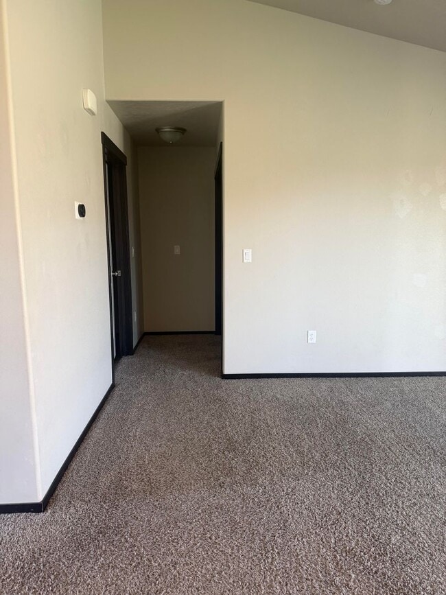 Building Photo - Lots of storage space in this 4- Car garage for all your playthings!!