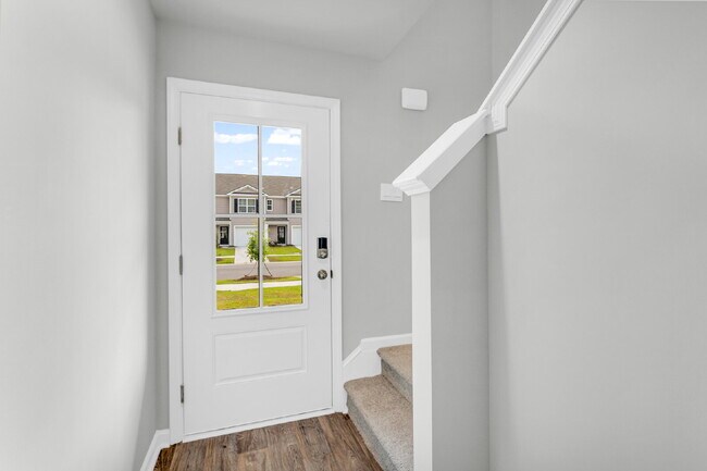 Building Photo - Beautiful Townhome at the Pines of New Hampstead