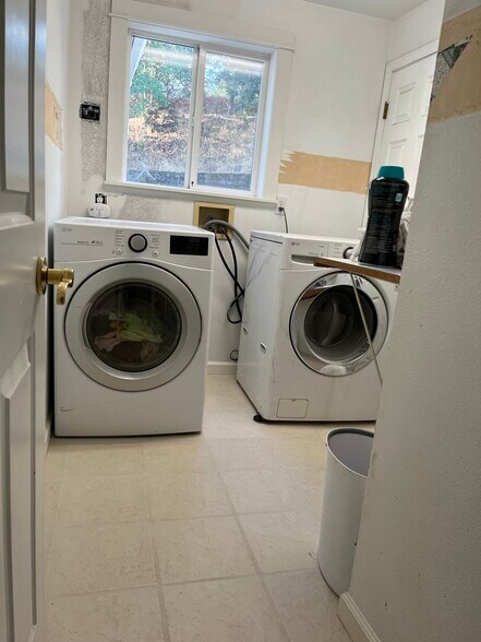 Laundry Room. Shared with one other tenant. - 2143 SE Douglas Ave